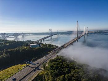 The fog lingers at the Forth Bridges on an early autumn morning