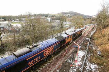 66761 and 66741 wait to push the track laying train towards Tweedbank with this view looking towards Galashiels.