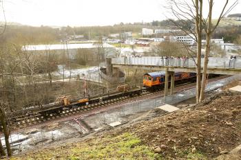 With a lot of interest from the locals in recording the historic event, 66761 sits below the spectators above Gala Water and opposite Borders College.