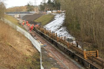 With about 1km to go to Tweedbank, the tracklaying train makes its slow progress towards the terminus on 4th Feb 2015